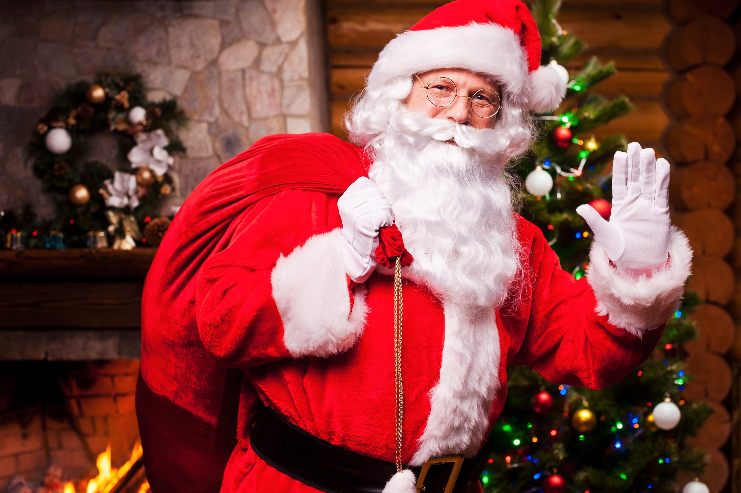 Santa waving to us carrying a bag of toys. Remember the importance of a sober Christmas for those in recovery.