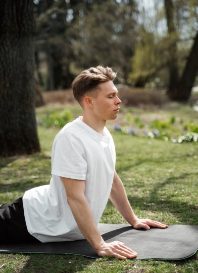 Man participating in Uplift Recovery's holistic meth detox in Los Angeles, practicing yoga for physical and emotional healing