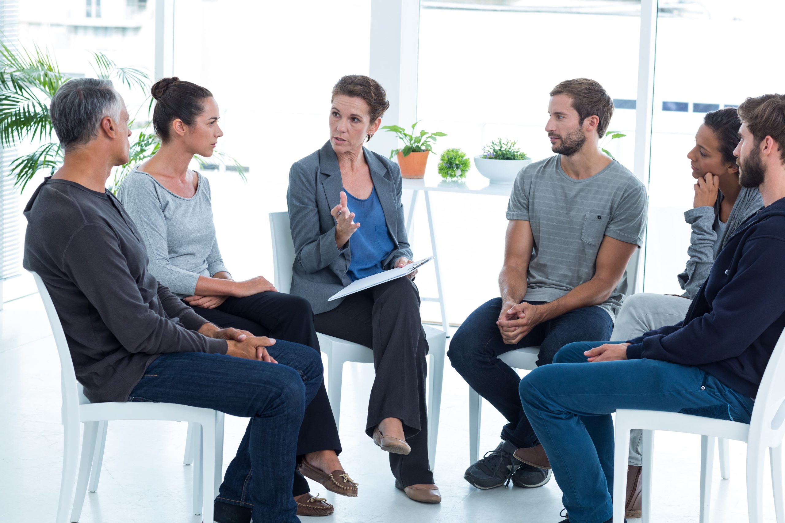 12-step vs non-12-step rehab group meeting